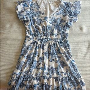 Eliza J floral dress.  Back zipper and elastic around the waist. Eyelet detail.
